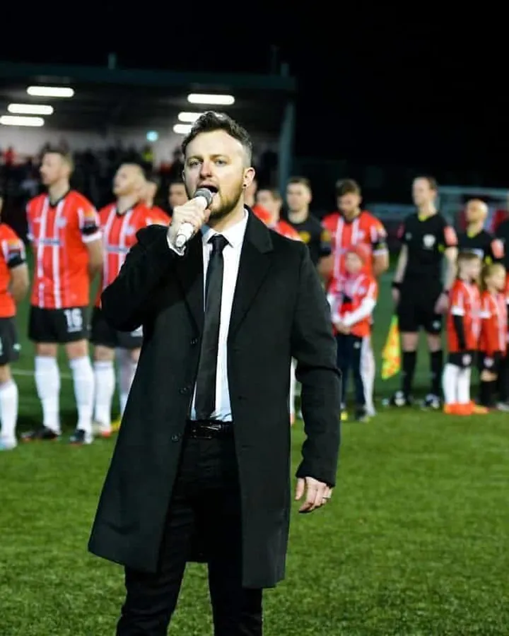 Conor McGinty singing the national anthem